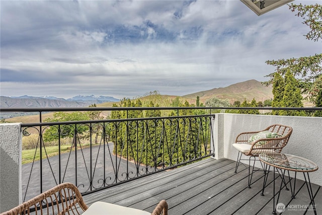 balcony featuring a mountain view