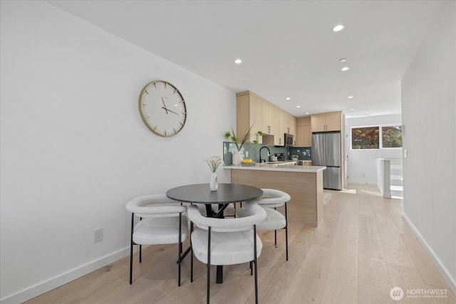 6032 42nd Ave SW Unit A, Seattle, WA 98136 - dining area with baseboards, light wood finished floors, and recessed lighting