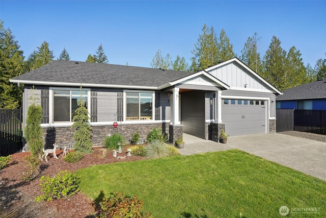 view of front of house featuring board and batten siding, driveway, fence, an attached garage, and stone siding