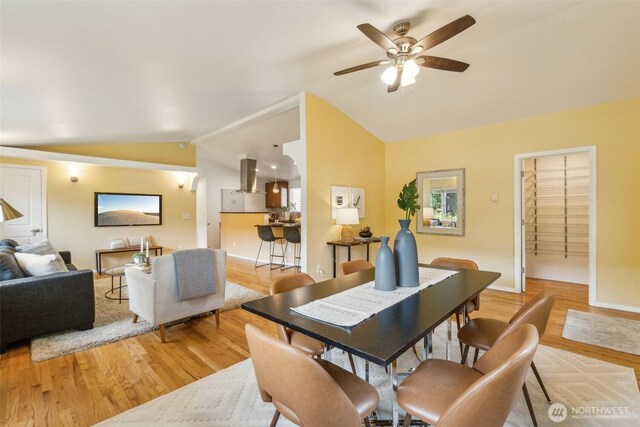 13503 Densmore Ave N, Seattle, WA 98133 - dining room with lofted ceiling, light wood finished floors, ceiling fan, and baseboards