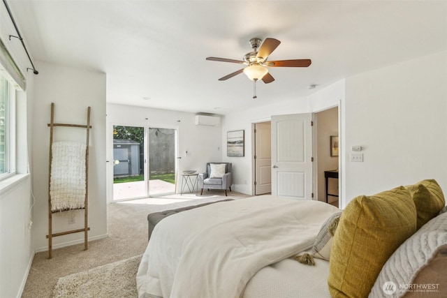13503 Densmore Ave N, Seattle, WA 98133 - bedroom featuring a wall unit AC, access to exterior, carpet flooring, baseboards, and a ceiling fan
