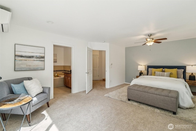 13503 Densmore Ave N, Seattle, WA 98133 - bedroom with light carpet, ensuite bathroom, a ceiling fan, and baseboards