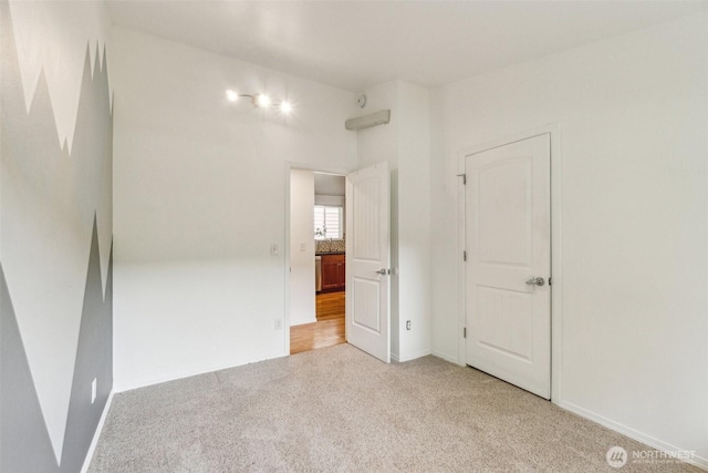 13503 Densmore Ave N, Seattle, WA 98133 - unfurnished room featuring light colored carpet and baseboards