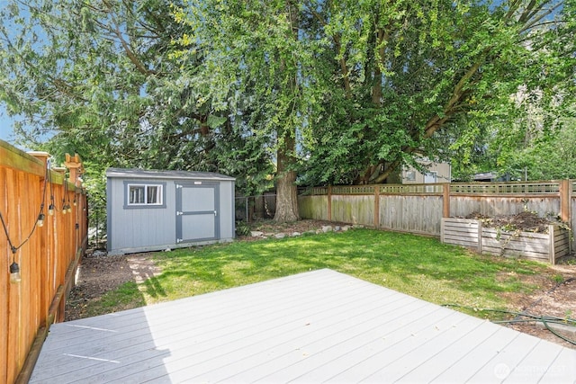 13503 Densmore Ave N, Seattle, WA 98133 - wooden terrace featuring a storage unit and an outdoor structure