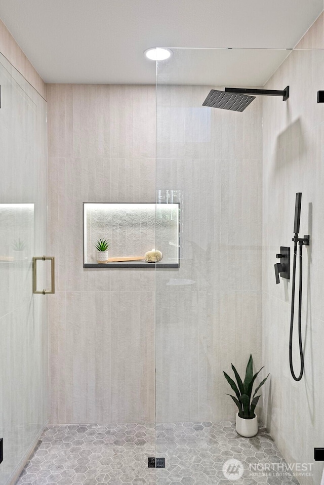 full bathroom with a stall shower