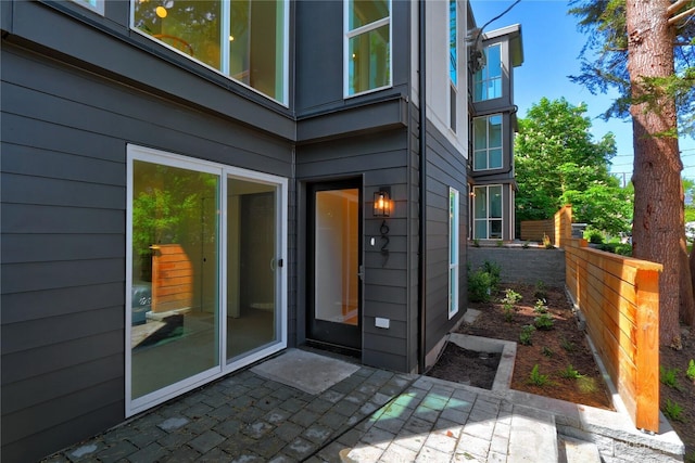 627A W Emerson St, Seattle, WA 98119 - doorway to property with fence and a patio