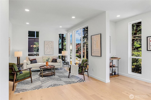 627A W Emerson St, Seattle, WA 98119 - living room with recessed lighting, baseboards, and wood finished floors