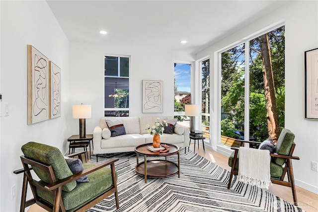 627A W Emerson St, Seattle, WA 98119 - living room featuring light wood-style floors and recessed lighting