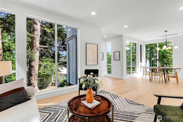 627A W Emerson St, Seattle, WA 98119 - living area featuring plenty of natural light, recessed lighting, and light wood-style flooring
