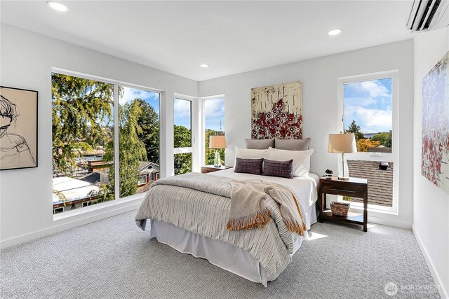 627A W Emerson St, Seattle, WA 98119 - bedroom featuring an AC wall unit, carpet flooring, and recessed lighting
