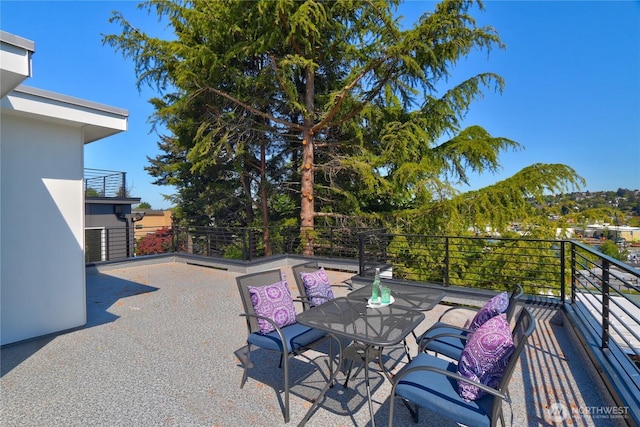 627A W Emerson St, Seattle, WA 98119 - view of patio featuring outdoor dining area and a balcony