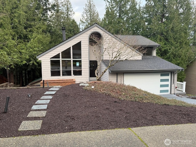 22606 NE 14th Dr, Sammamish, WA 98074 - view of front of house with roof with shingles, an attached garage, and driveway