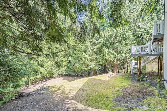 22606 NE 14th Dr, Sammamish, WA 98074 - view of yard with a wooden deck and stairs