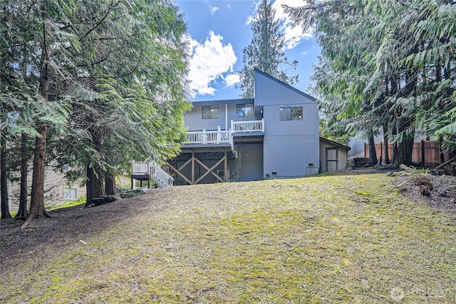 22606 NE 14th Dr, Sammamish, WA 98074 - rear view of house featuring a yard