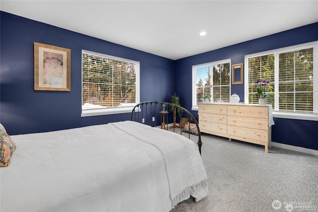 carpeted bedroom with baseboards and recessed lighting