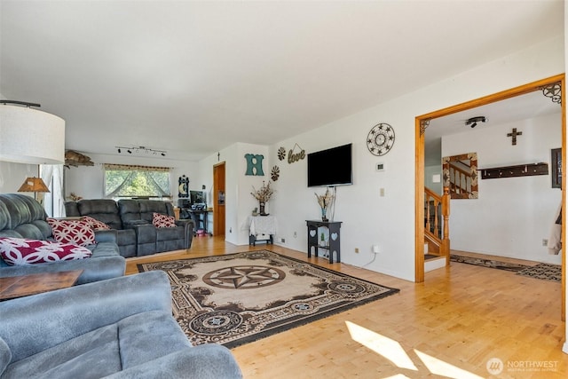 584 Gish Rd, Onalaska, WA 98570 - living area featuring stairway and wood finished floors