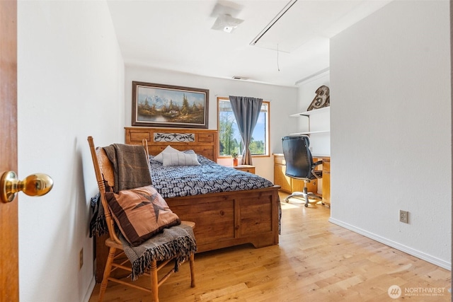 584 Gish Rd, Onalaska, WA 98570 - bedroom featuring baseboards, visible vents, attic access, and light wood-type flooring