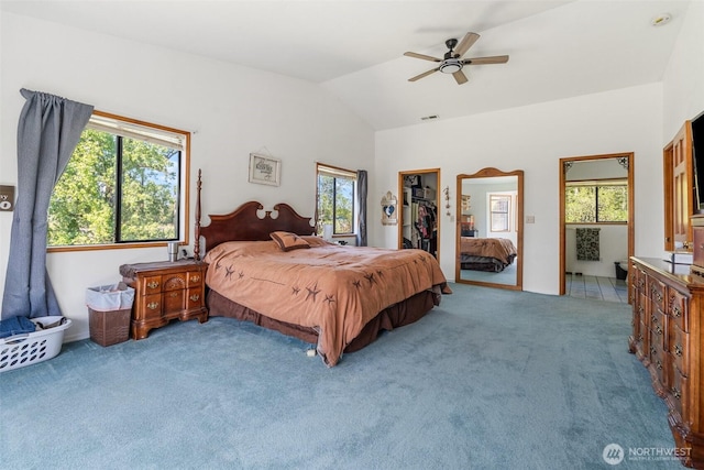 584 Gish Rd, Onalaska, WA 98570 - carpeted bedroom featuring a ceiling fan, visible vents, a closet, a spacious closet, and lofted ceiling