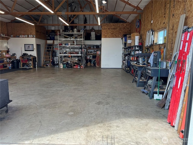 garage with a workshop area