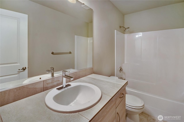 18214 37th Ave E, Tacoma, WA 98446 - full bath featuring vanity, shower / bathing tub combination, toilet, and tile patterned flooring