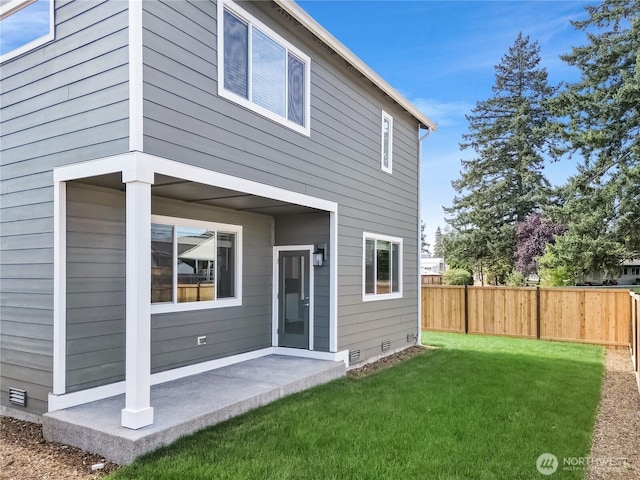 18214 37th Ave E, Tacoma, WA 98446 - back of property with fence, a patio, a lawn, and crawl space