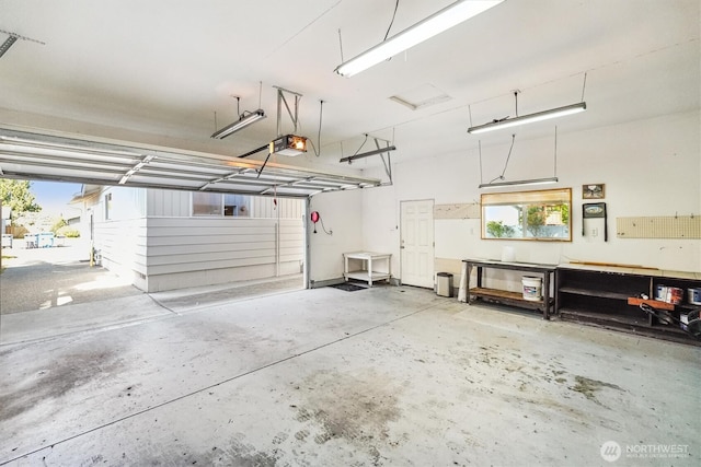 1015 14th St NW, Puyallup, WA 98371 - garage featuring a garage door opener