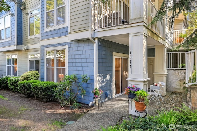 entrance to property with a balcony