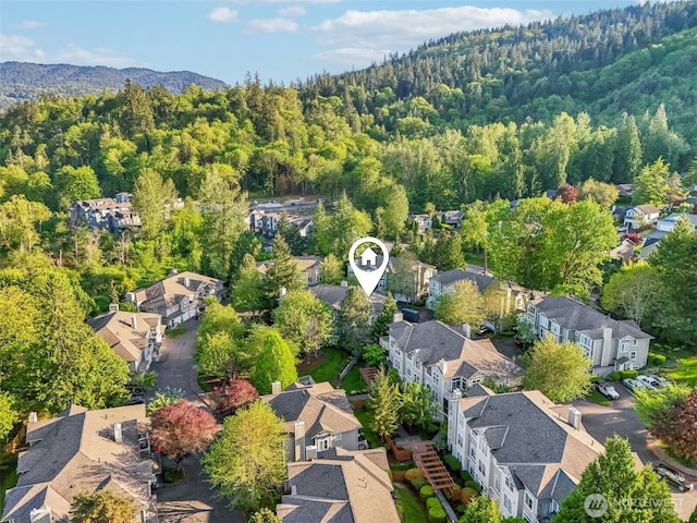 aerial view with a view of trees and a residential view