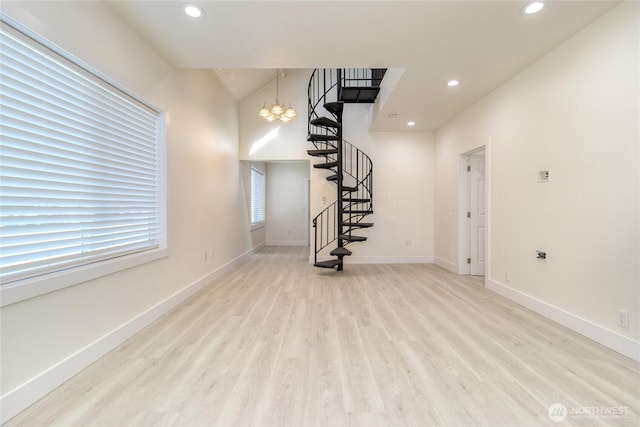 442 N 7th, Walla Walla, WA 99362 - unfurnished living room featuring wood finished floors, stairway, baseboards, a chandelier, and recessed lighting