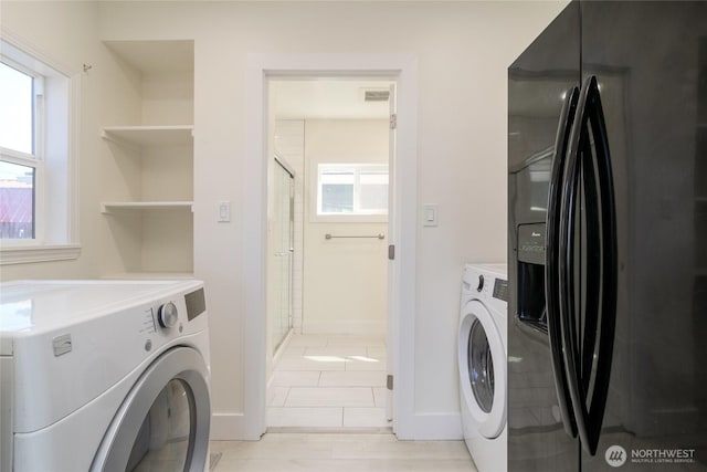 442 N 7th, Walla Walla, WA 99362 - laundry room with visible vents, baseboards, and washer and dryer