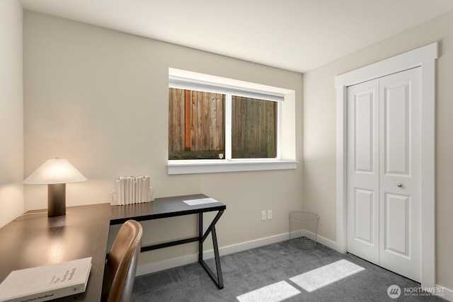 office with baseboards and carpet flooring