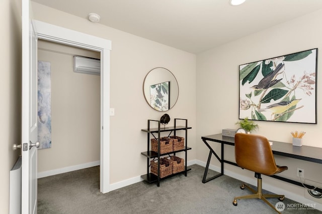 carpeted home office featuring baseboards and a wall mounted AC