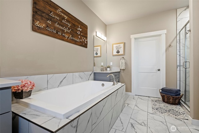 full bathroom featuring a bath, vanity, marble finish floor, and a stall shower