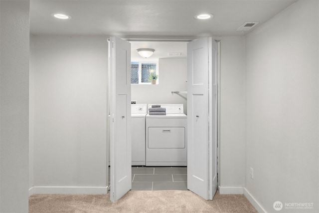 laundry area featuring washer and clothes dryer, carpet flooring, recessed lighting, and baseboards