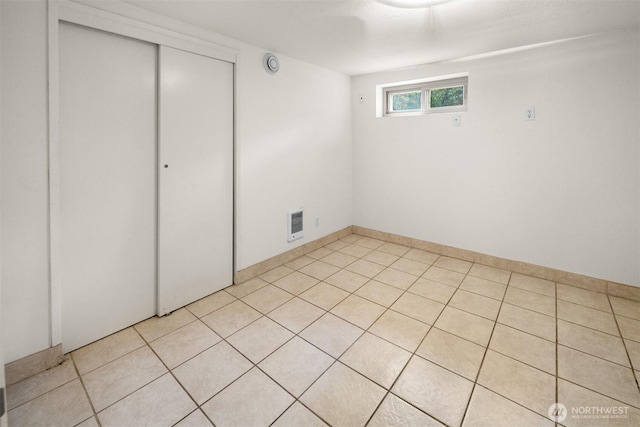6638 Corson Ave S, Seattle, WA 98108 - interior space featuring light tile patterned flooring, visible vents, and a closet