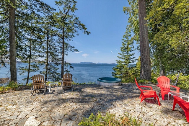 30 Smugglers Rowe, Henry Island, WA 98250 - view of patio / terrace with a water and mountain view