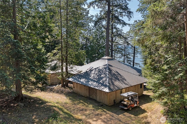 30 Smugglers Rowe, Henry Island, WA 98250 - view of side of home with metal roof