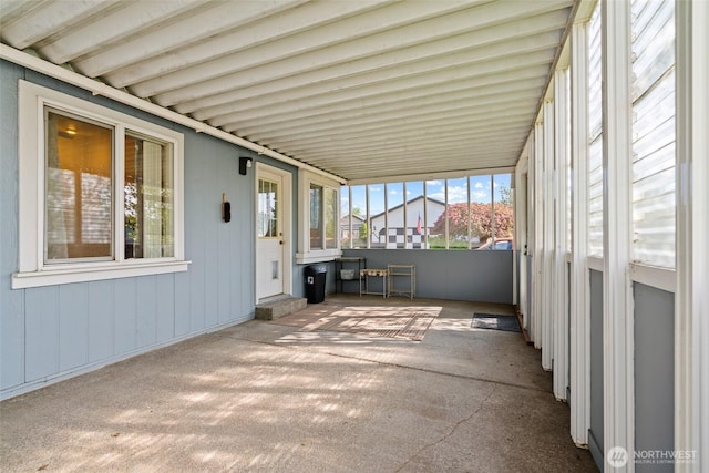 view of patio featuring an attached carport