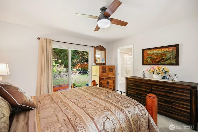 bedroom with ceiling fan and ensuite bath