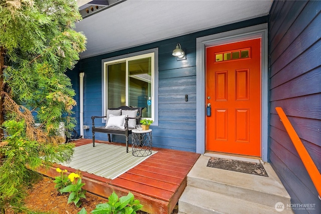 18514 71st St NW, Vaughn, WA 98394 - view of exterior entry featuring a porch