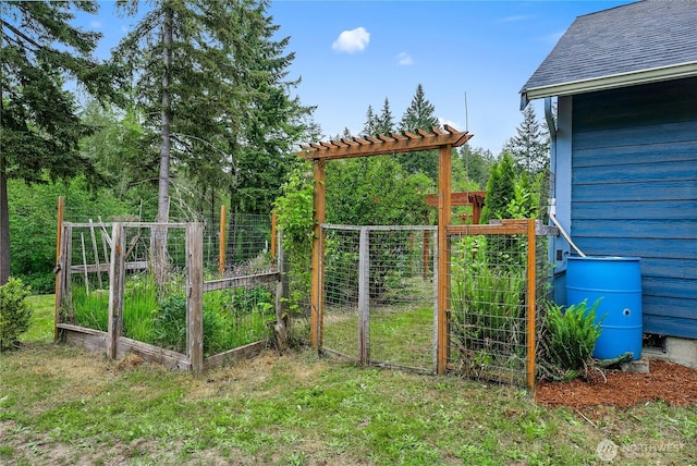 18514 71st St NW, Vaughn, WA 98394 - gate with a vegetable garden
