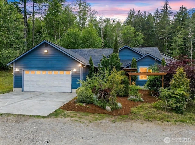 18514 71st St NW, Vaughn, WA 98394 - view of front of property featuring concrete driveway and an attached garage