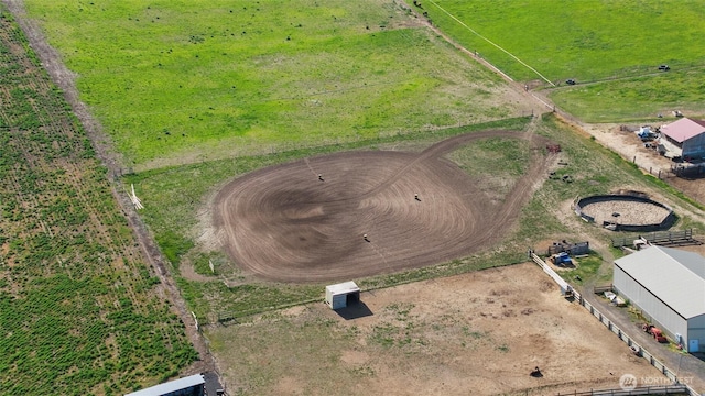birds eye view of property featuring a rural view