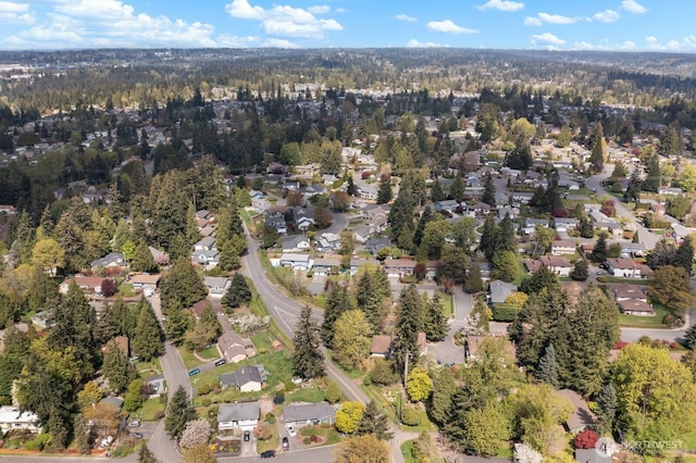 birds eye view of property with a residential view