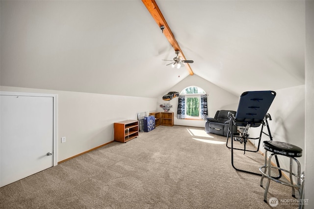 sitting room featuring carpet flooring, baseboards, a ceiling fan, and vaulted ceiling with beams