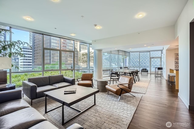 909 5th Ave Unit 701, Seattle, WA 98104 - living room featuring wood finished floors