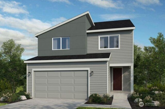 view of front of home featuring roof with shingles, an attached garage, and driveway