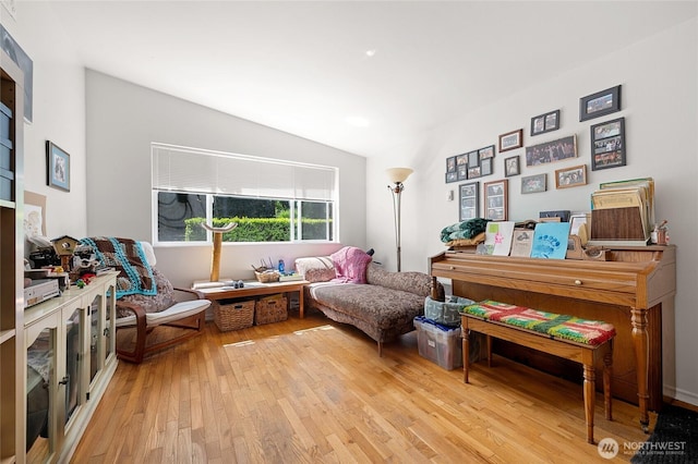 812 N 59th St, Seattle, WA 98103 - living area featuring light wood-style floors and vaulted ceiling