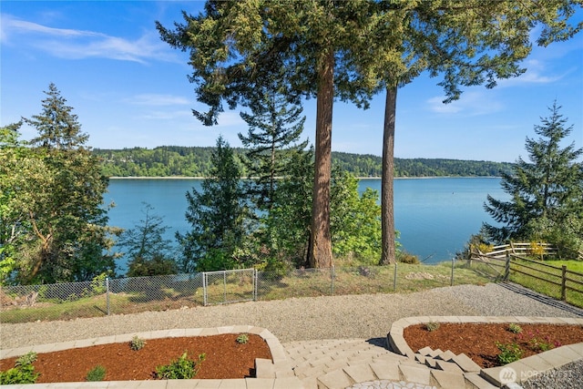 7295 Navajo Trl NE, Bremerton, WA 98311 - water view featuring a forest