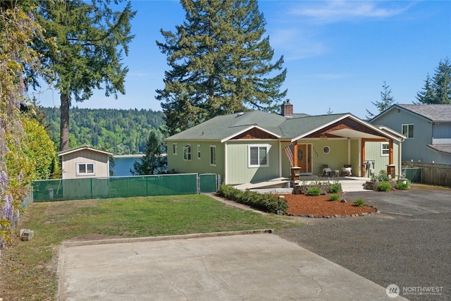 7295 Navajo Trl NE, Bremerton, WA 98311 - view of front of house featuring a porch and a chimney